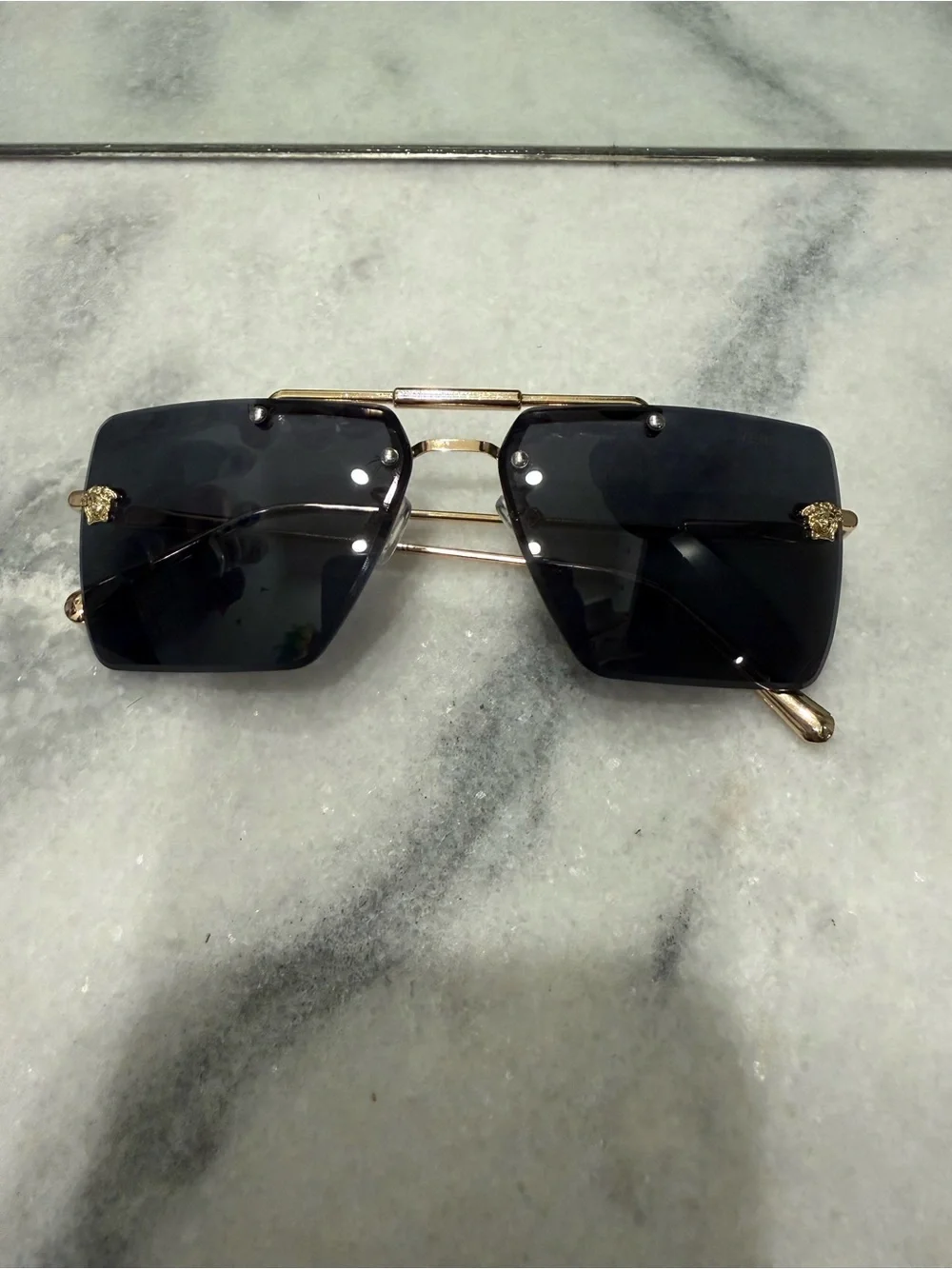Versace Men's Black Shield Sunglasses with Gold Medusa Accents